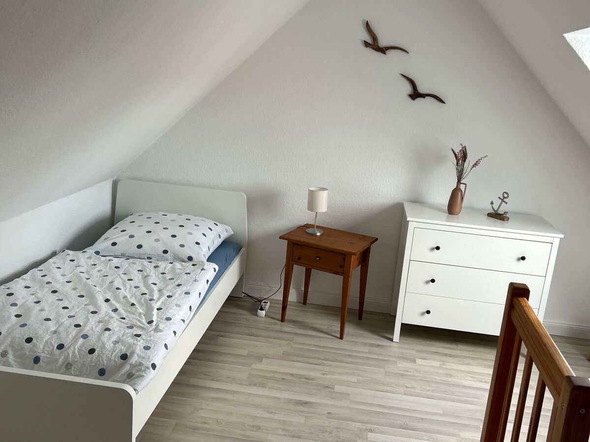 Zweites Schlafzimmer mit zwei Einzelbetten